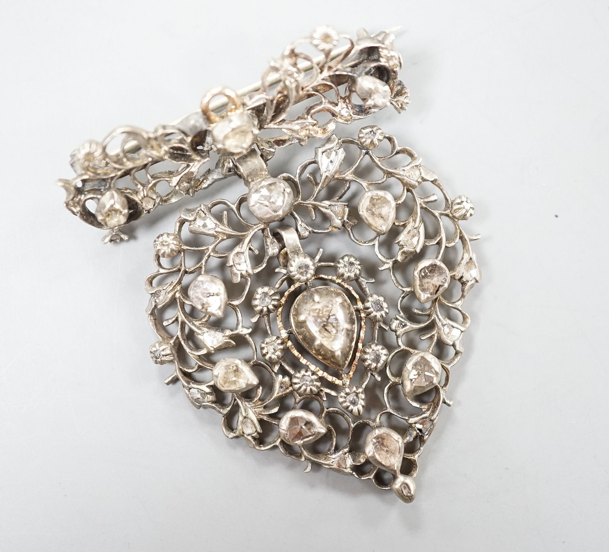 A 19th century white metal and rose cut diamond set heart shaped drop pendant brooch, 50mm.